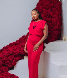 Red Jumpsuit with necklace