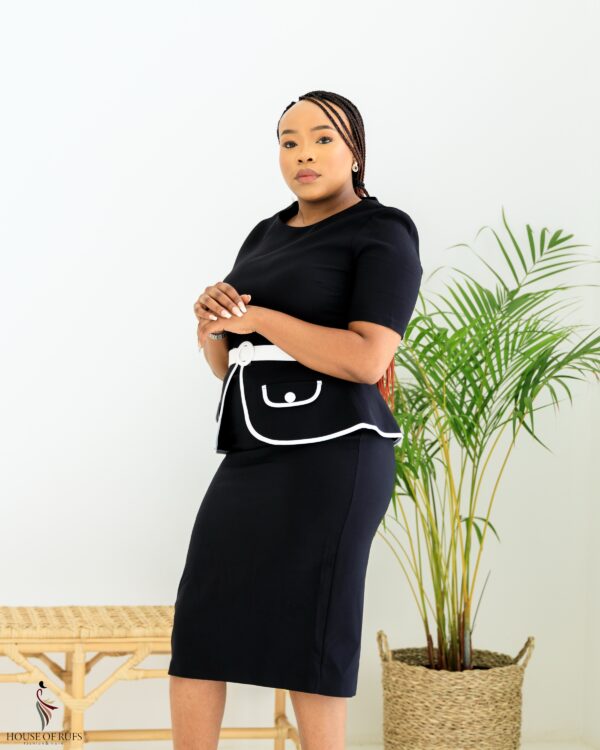 Black Peplum dress with white binding detail and belt