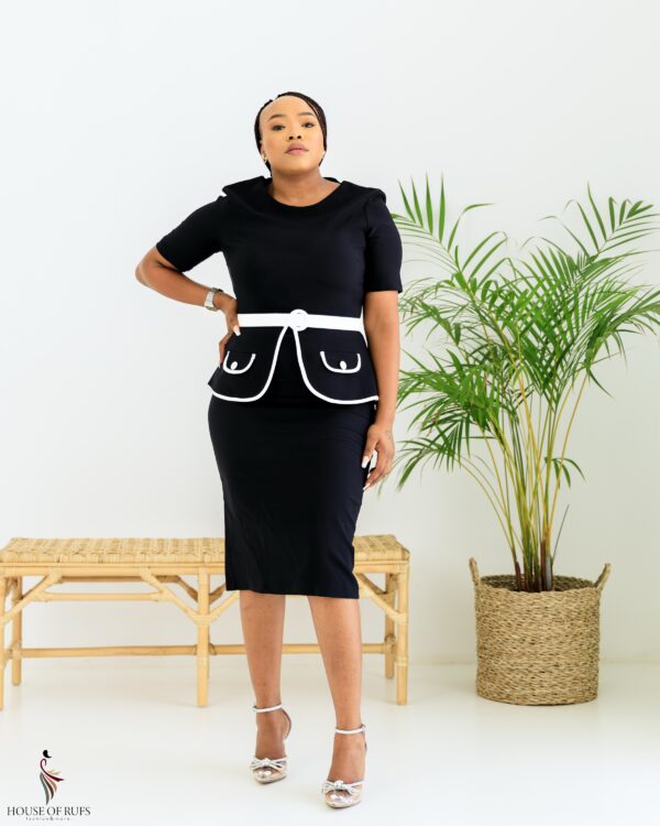 Black Peplum dress with white binding detail and belt - Image 2