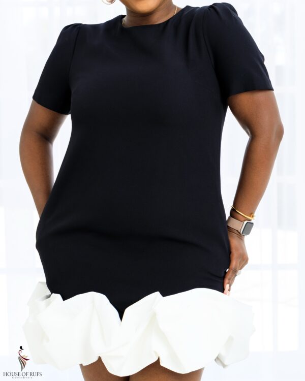 Black playful short dress with white bottom frill design - Image 6