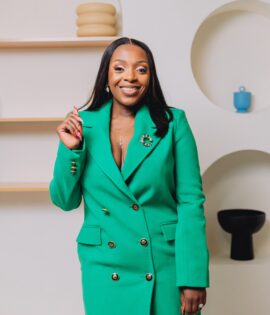 Green Coat with black  and gold buttons and pockets